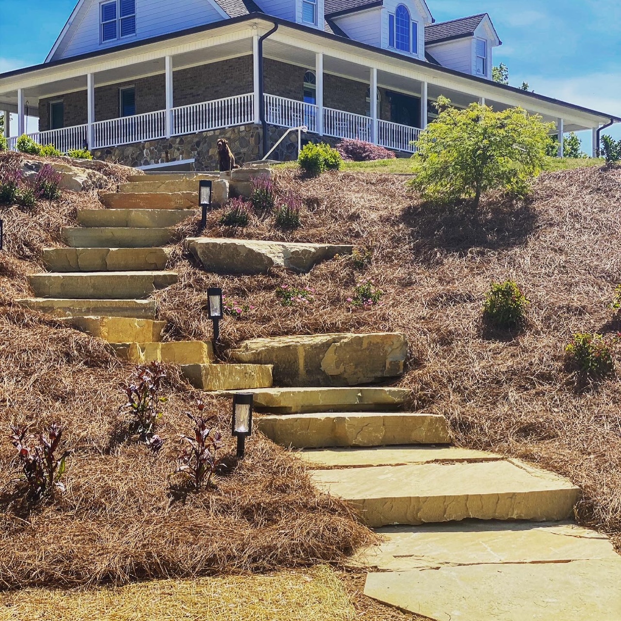 natural stone slab steps with landscaping